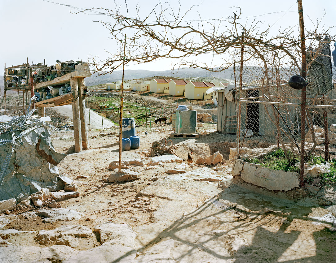 Umm al-Khayr, Bedouin village and Carmel, Israeli settlement,  South Hebron Hills.<br/>West Bank, Area C – closed military area – full Israeli control over security, planning and construction.